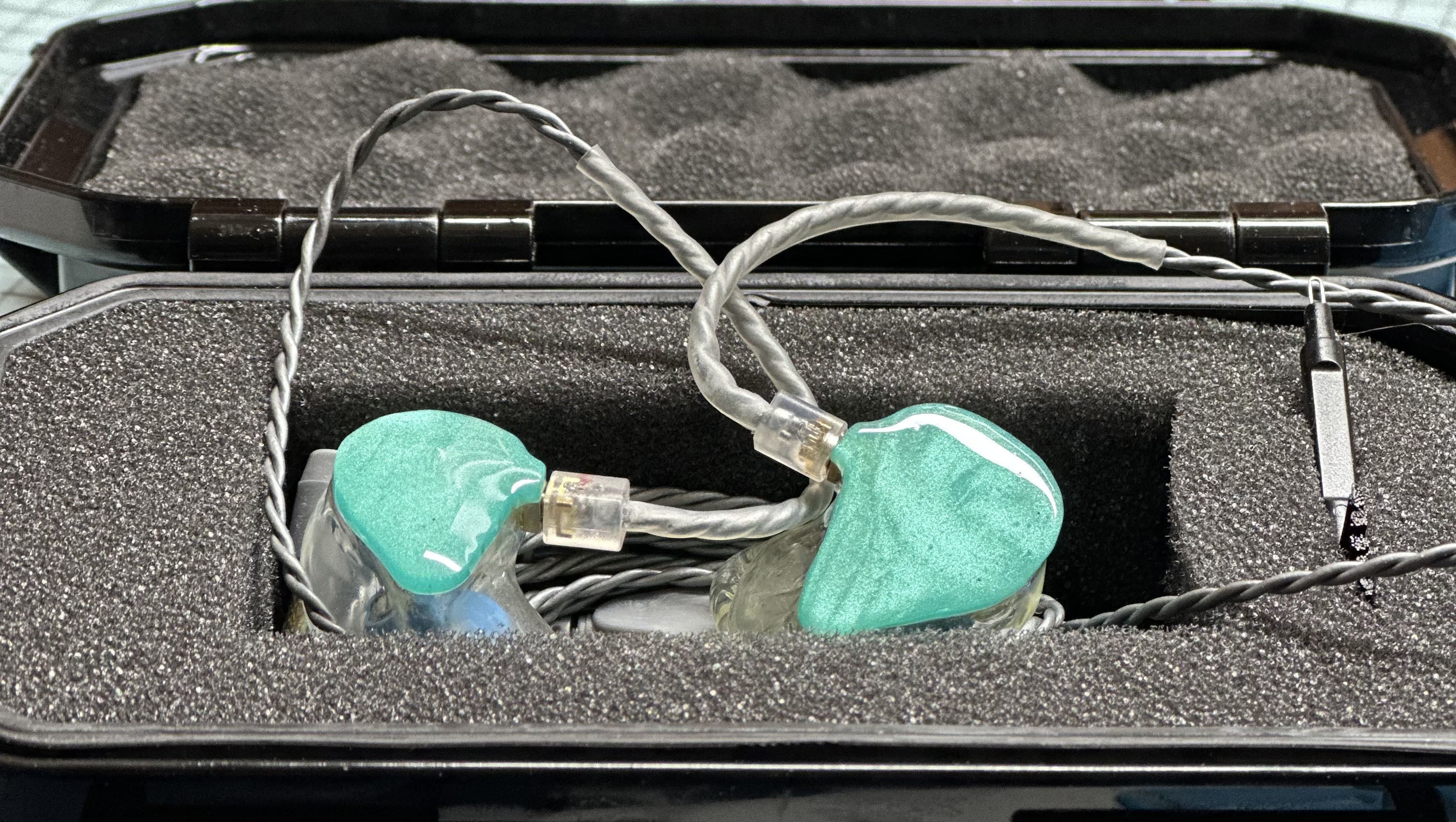 Turquoise custom Vibe9 in-ear monitors